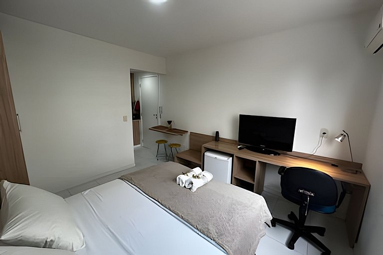 Suíte com mini cozinha e piscina