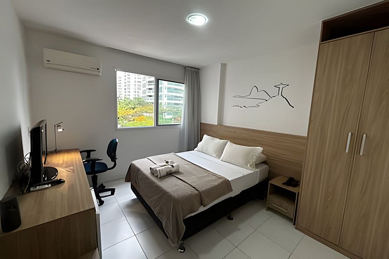 Suíte com mini cozinha e piscina