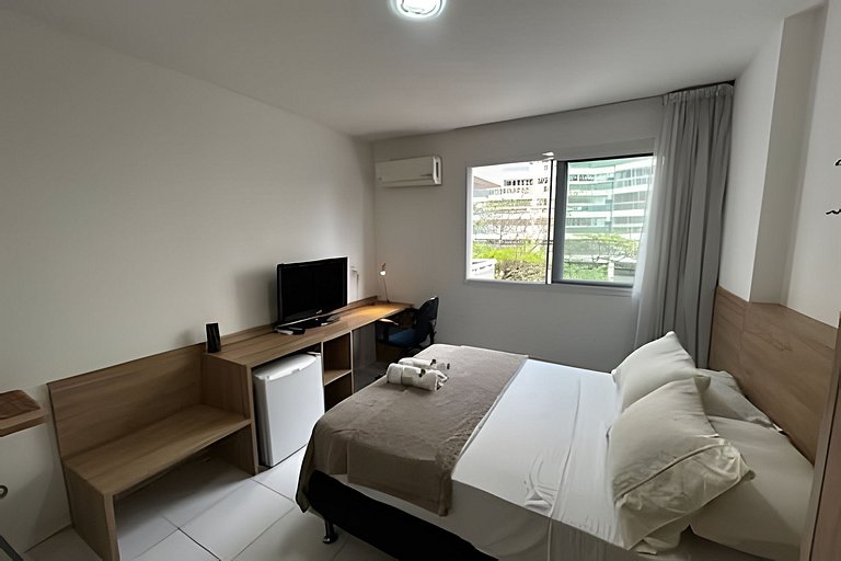 Suíte com mini cozinha e piscina