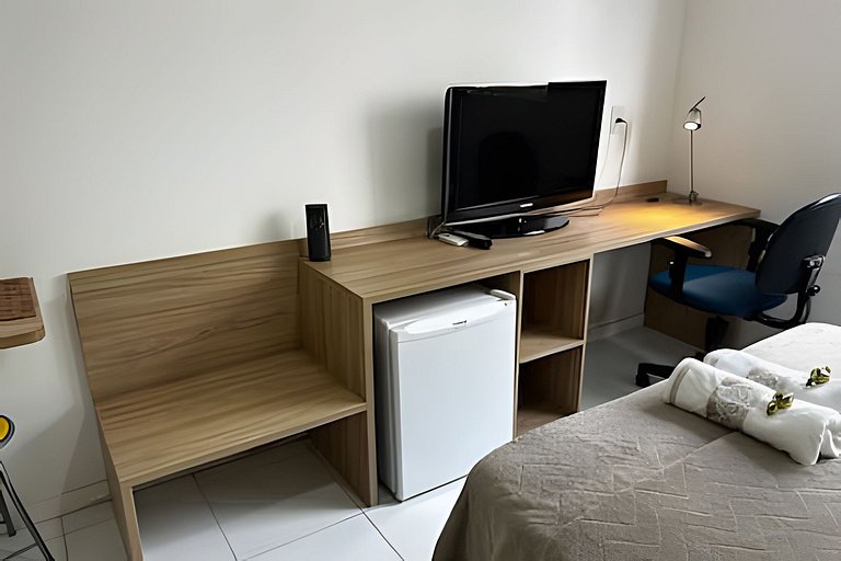 Suíte com mini cozinha e piscina