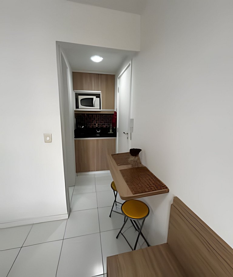 Suíte com mini cozinha e piscina