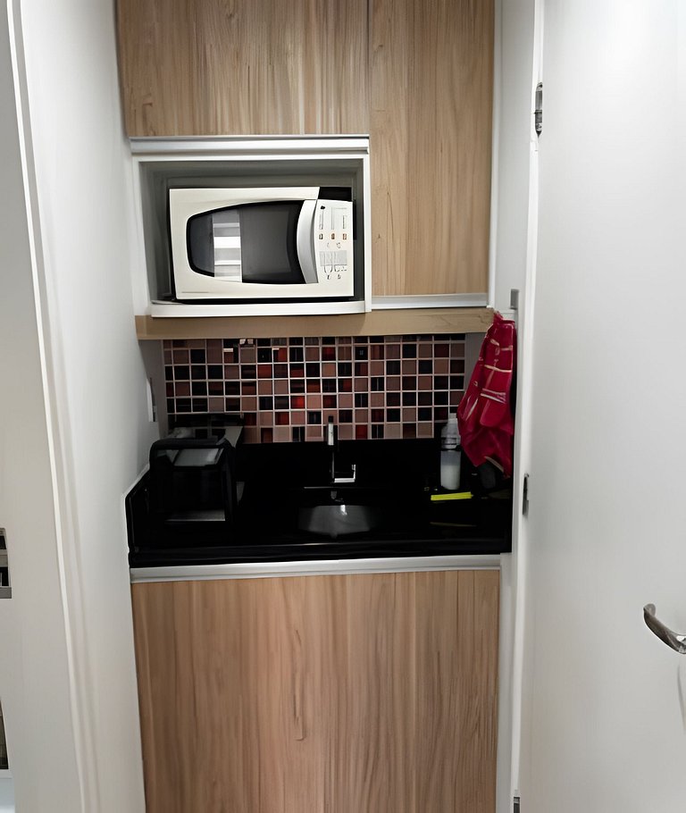 Suíte com mini cozinha e piscina