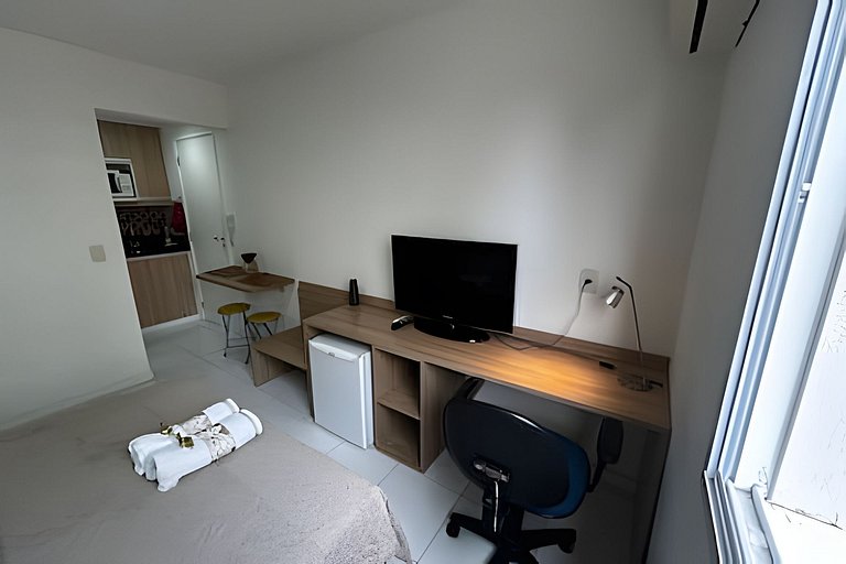 Suíte com mini cozinha e piscina