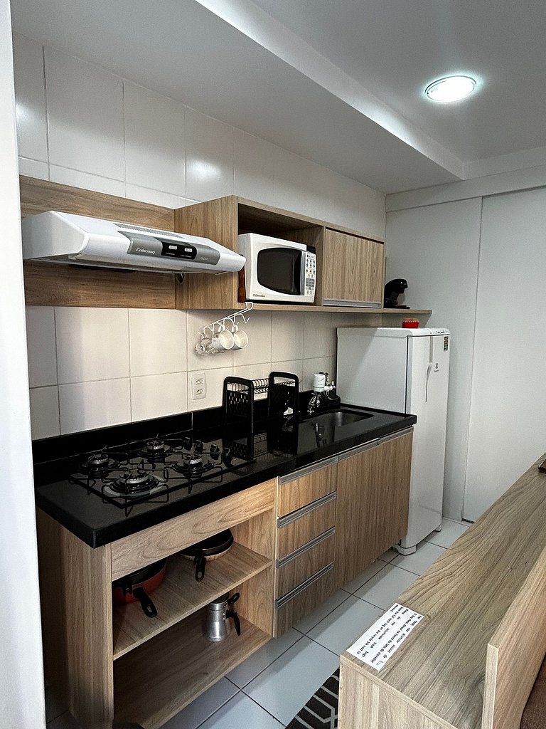Flat em Rio2, cozinha equipada, piscina, internet de 500 Mb